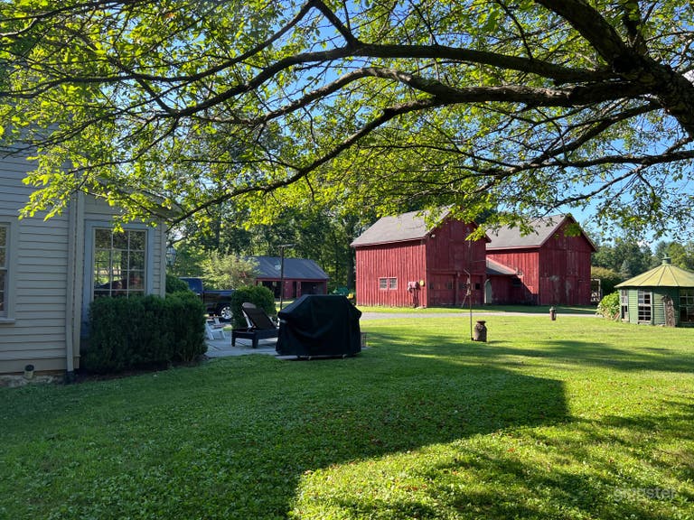  Beautiful 30-acre farm with pond and old barns 