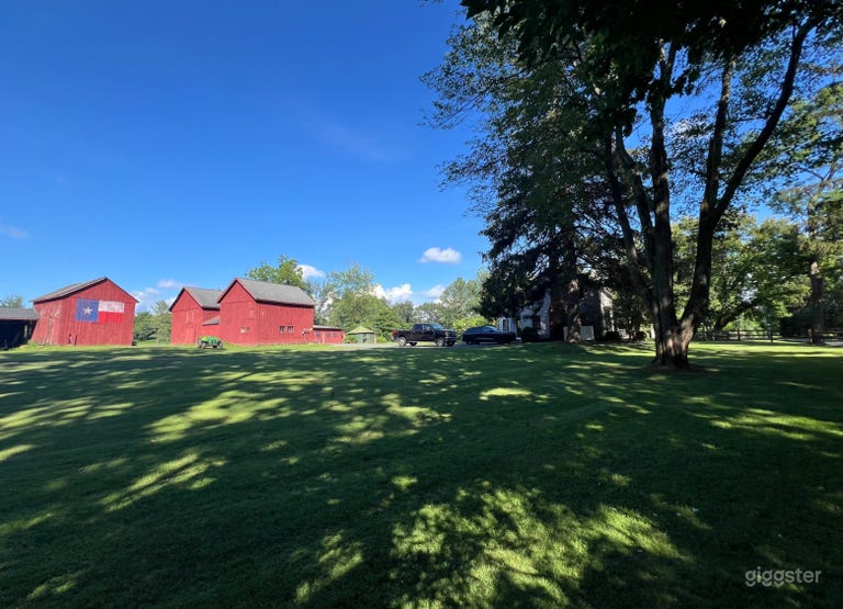  Beautiful 30-acre farm with pond and old barns 