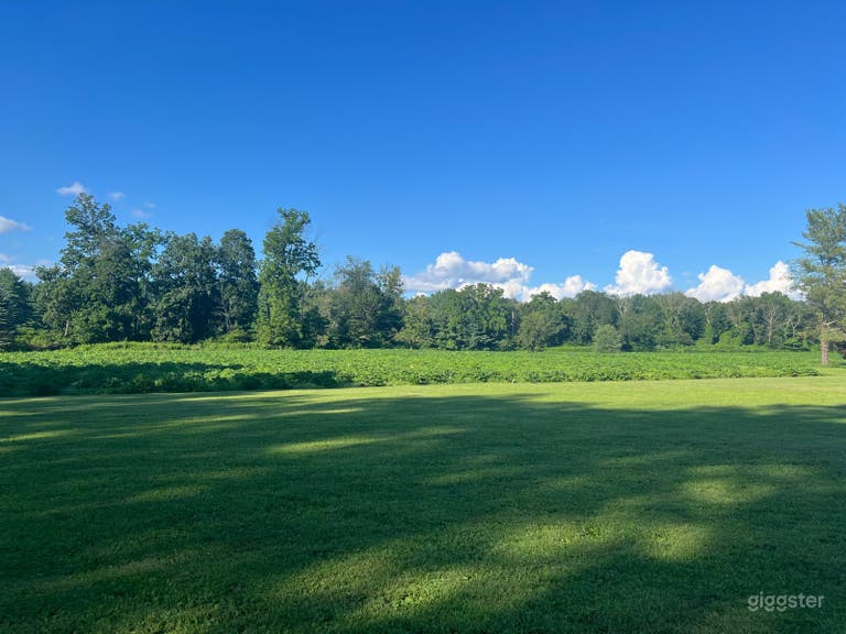  Beautiful 30-acre farm with pond and old barns 
