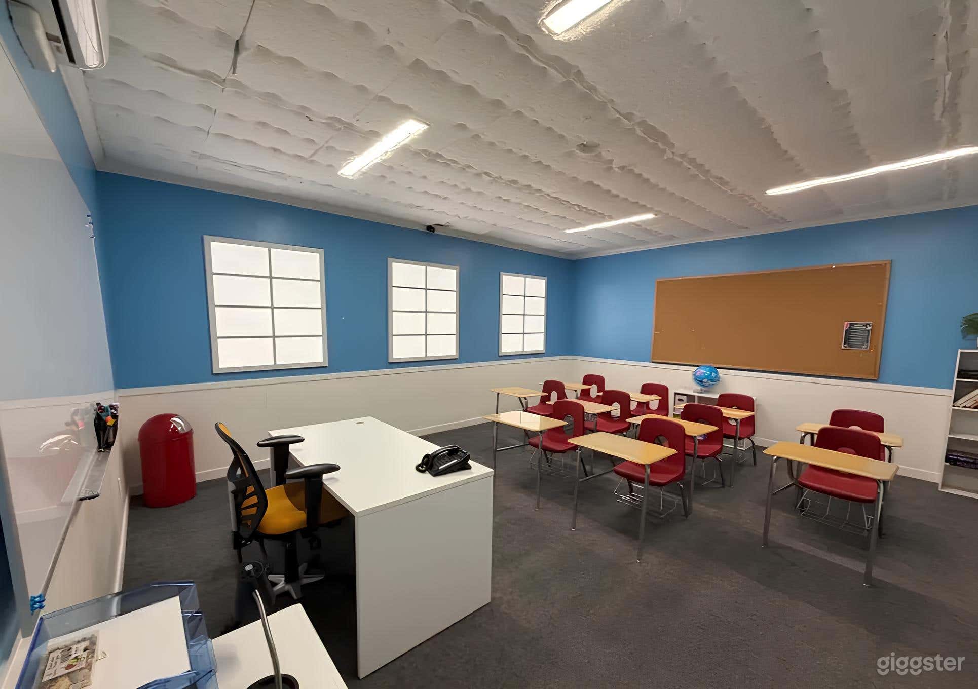 Fully designed classroom with desks Photo 1