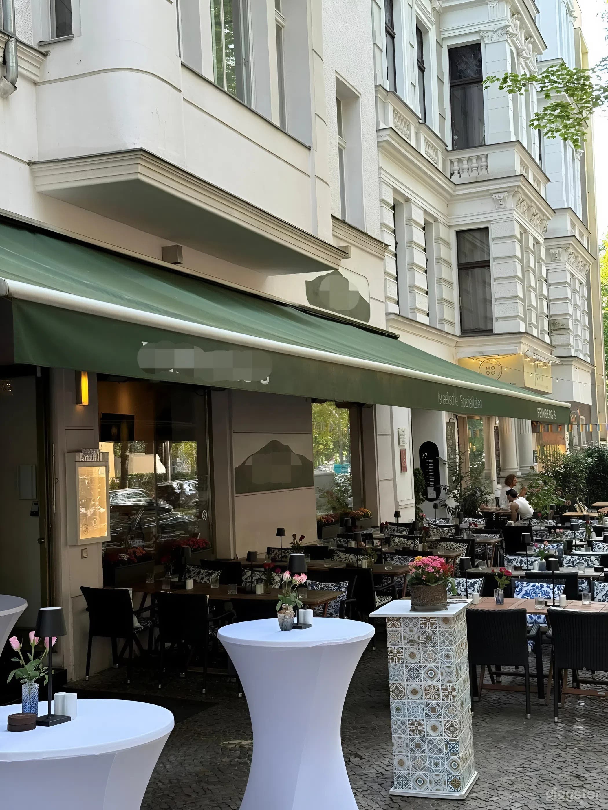 Covered Outdoor Terrace with Heaters & Seating Photo 1