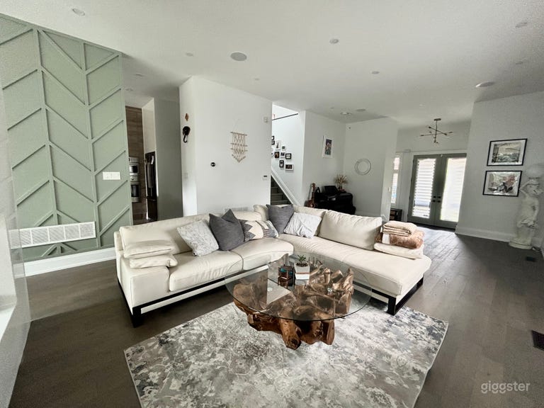  Spacious, bright, modern living room with nature based palette. Galeleio piano and statue imported from Italy, one of a kind coffee table custom made from Sri Lanka. 