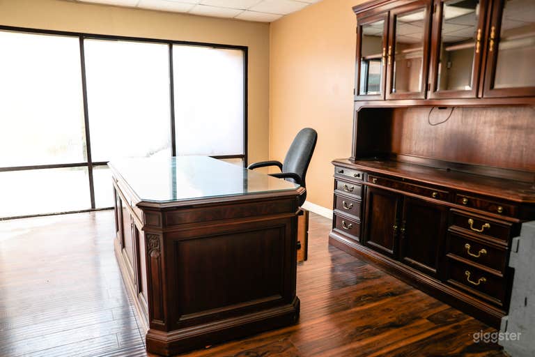  One of many office rooms with furniture 