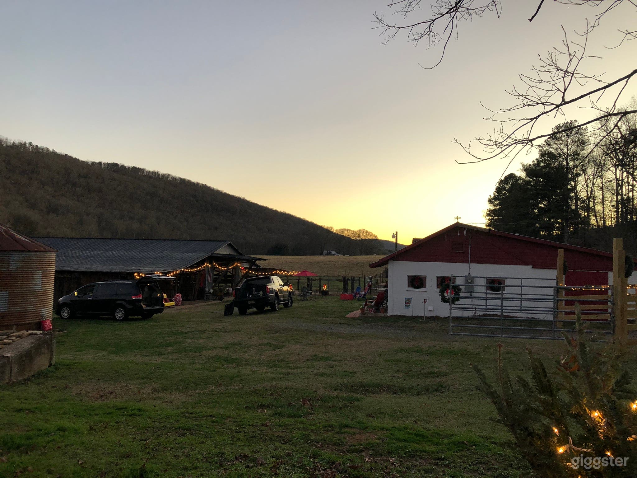 Beautiful valley sunsets at night come alive with cafe lights glowing on our larger cattle barn. 