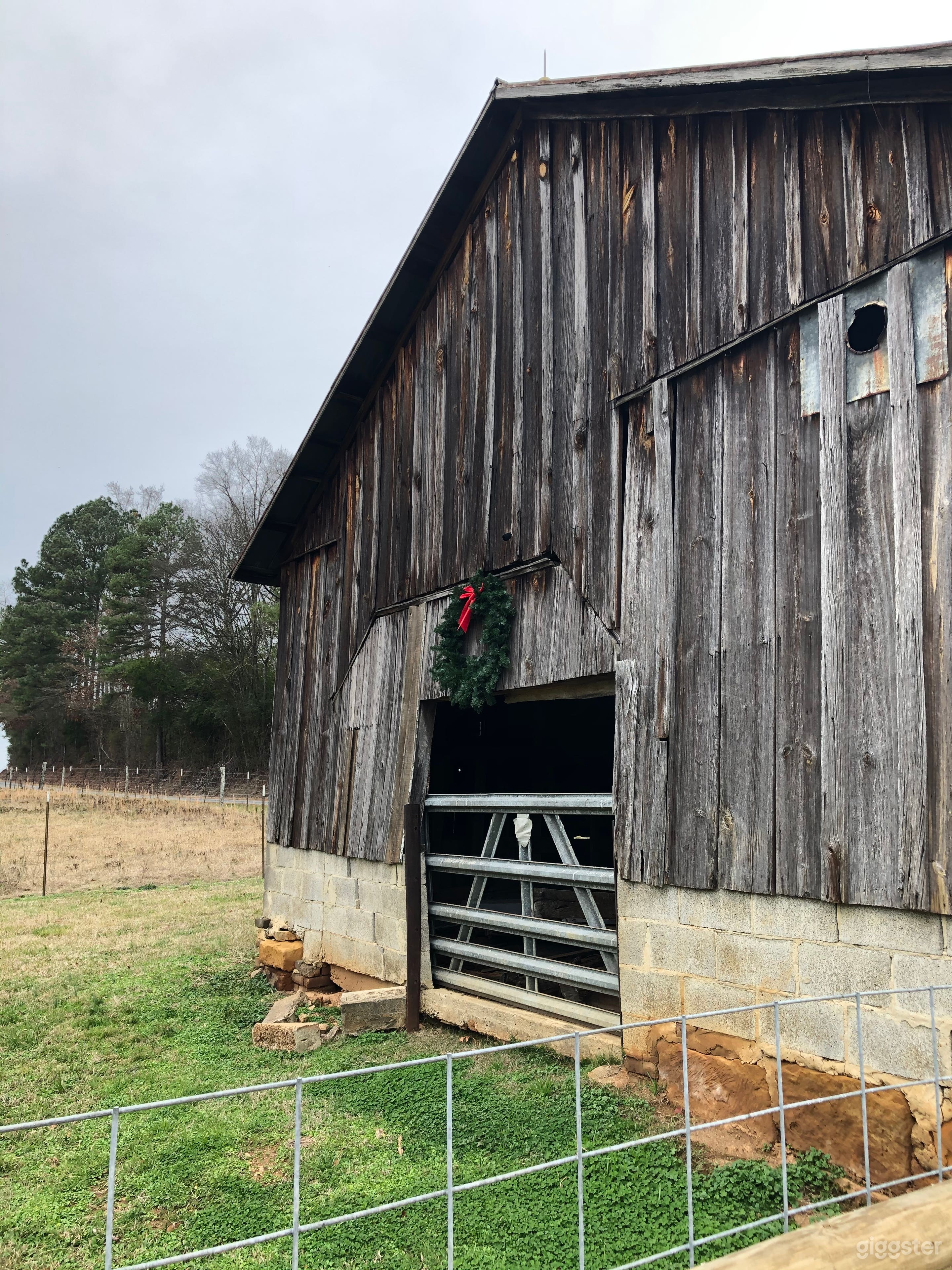 Clear Spring Farm decorated for Christmas, 2019. (Pictured here, our early 1900s calf barn featuring rustic hand-hewn board and batten exterior). 