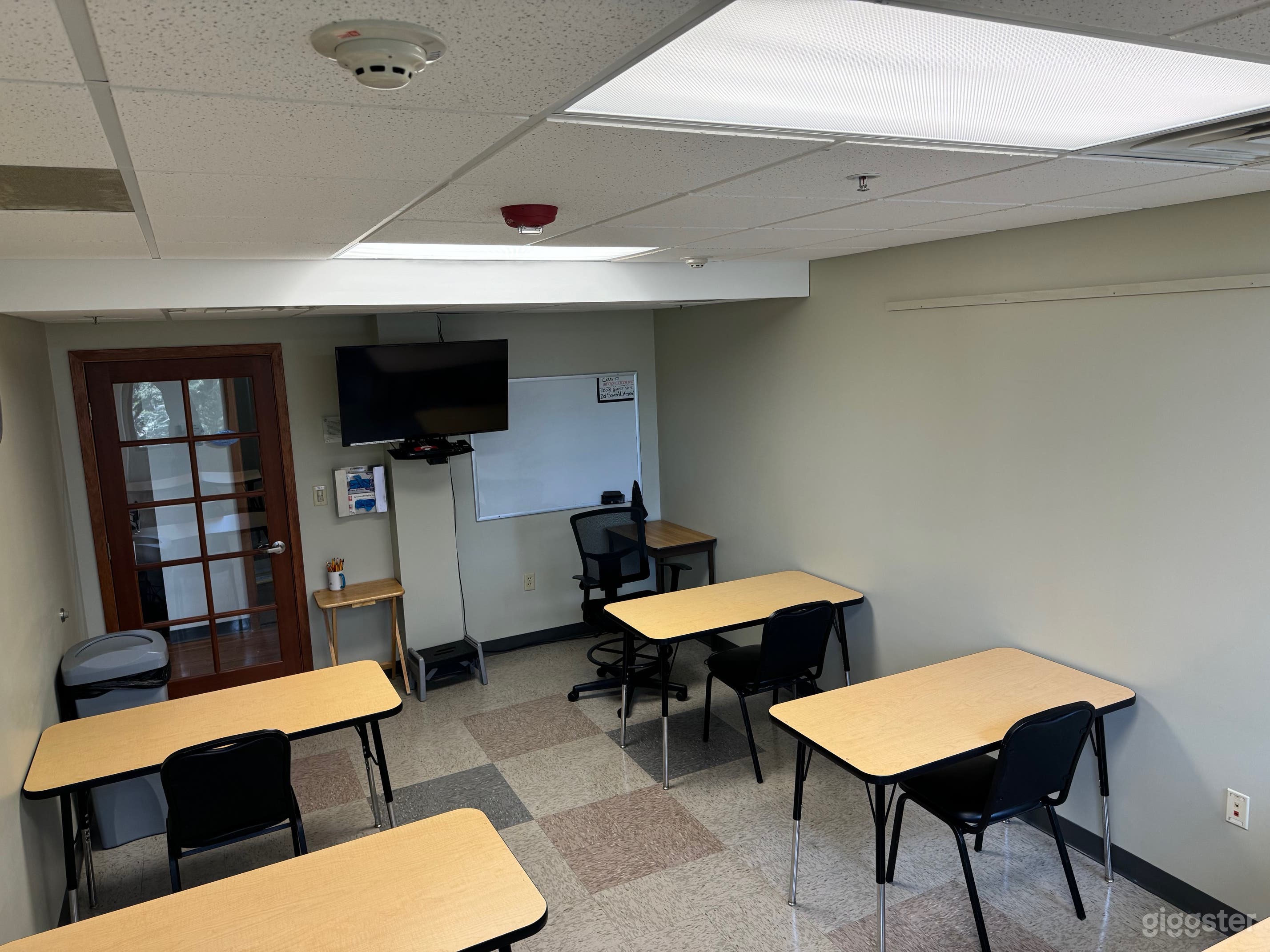 Classroom style setup looking from the back of the room