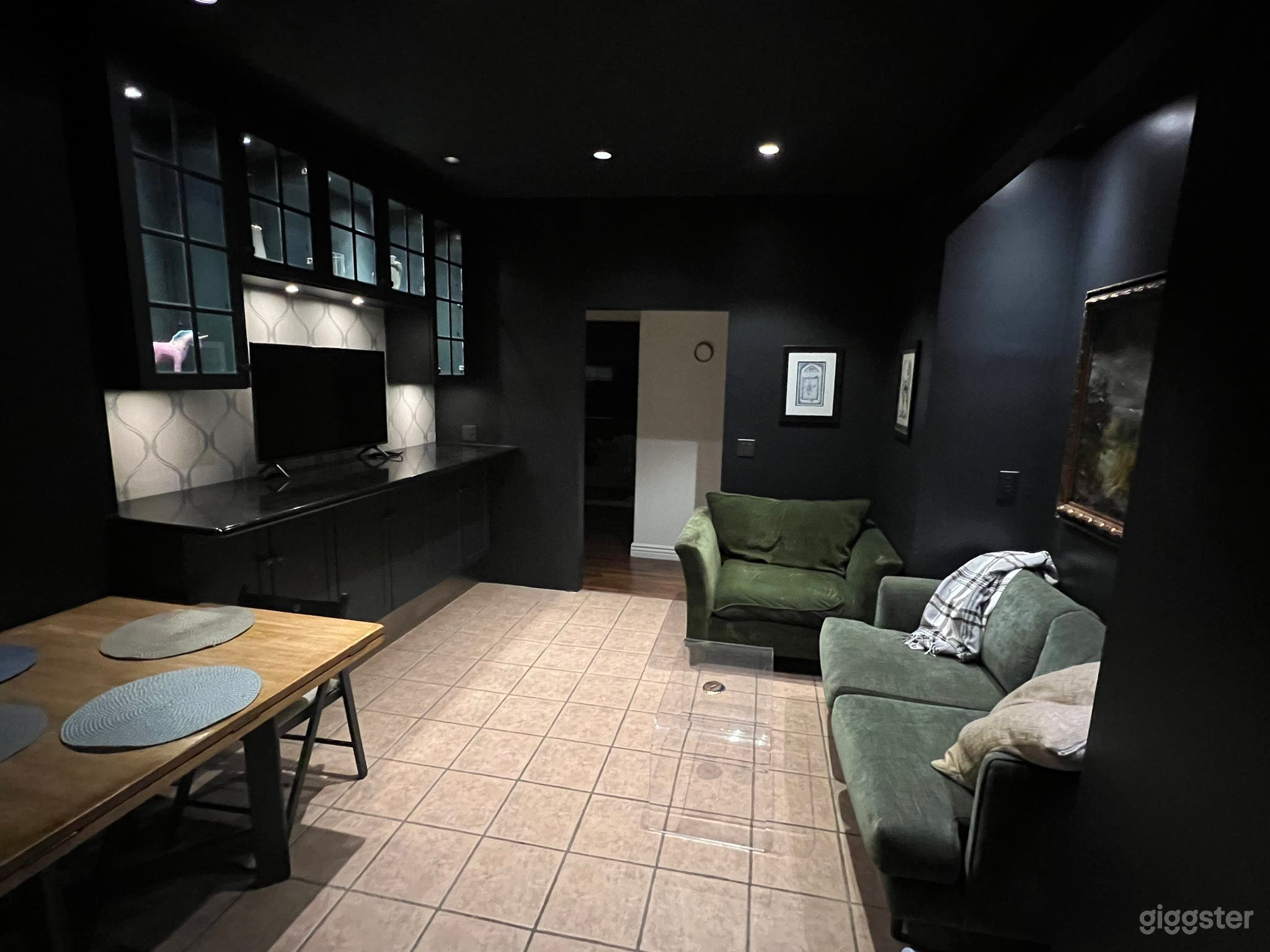 black kitchen with lighted cabinets