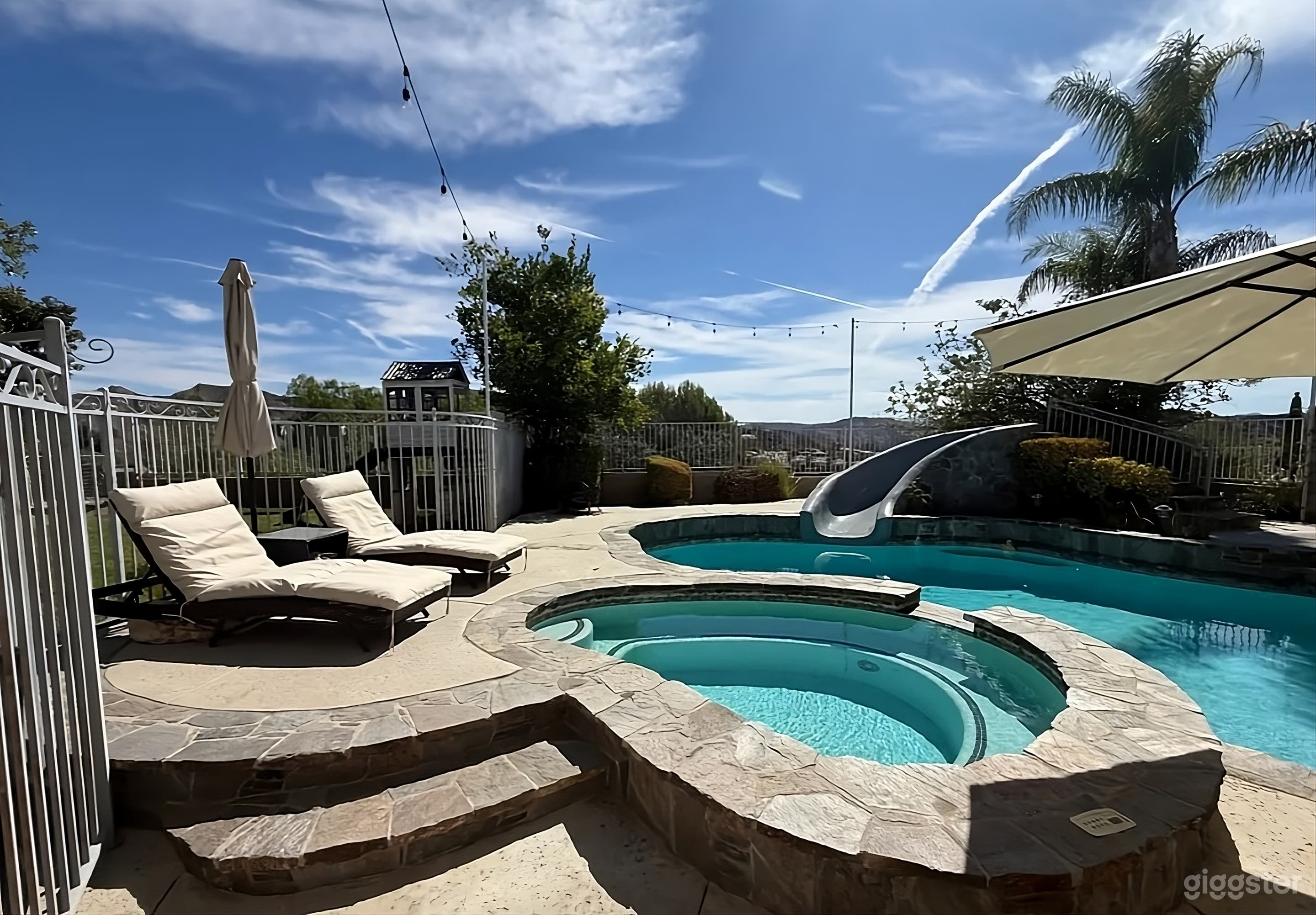 Sun Drenched Backyard Paradise Photo 2