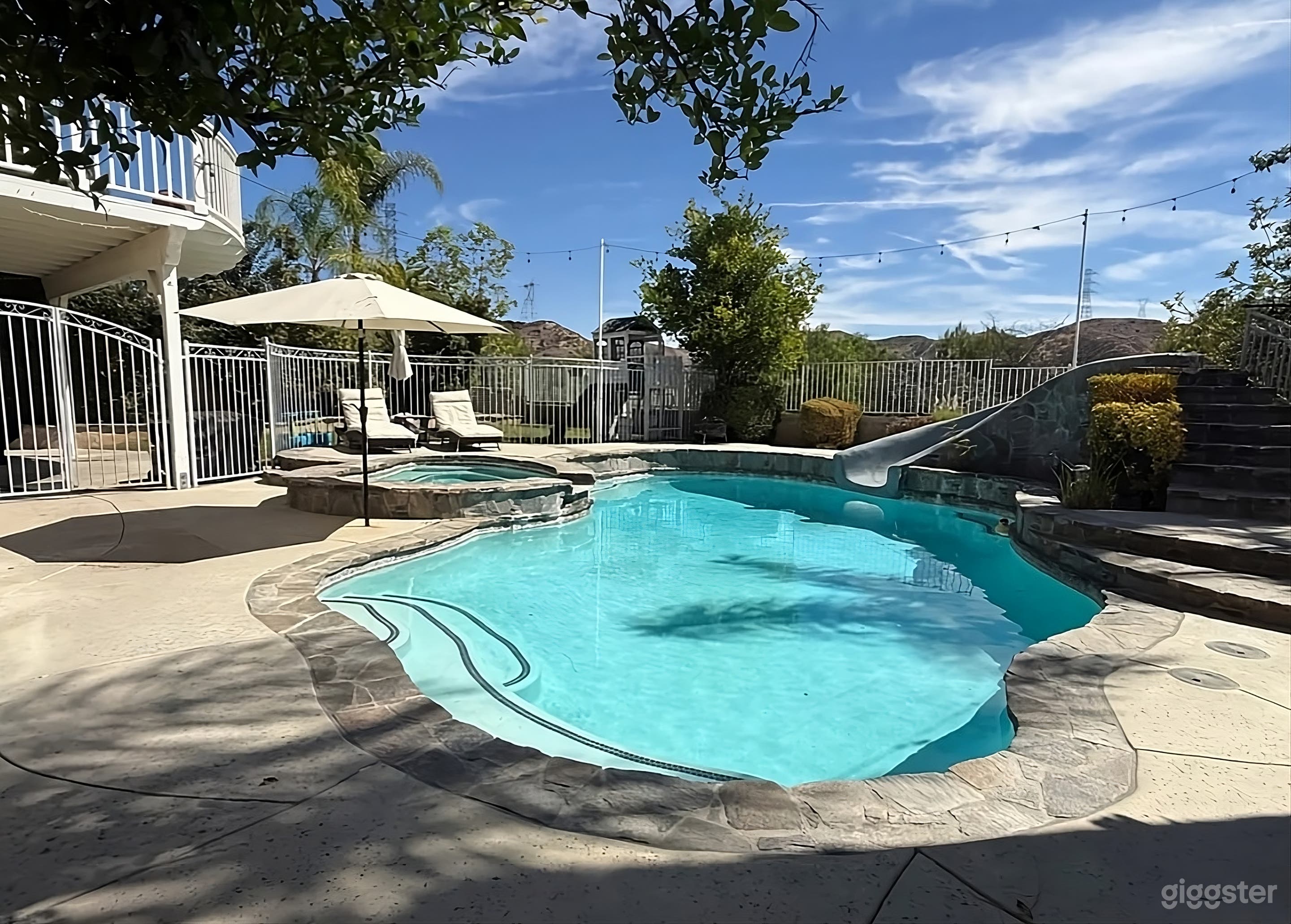 Sun Drenched Backyard Paradise Photo 1