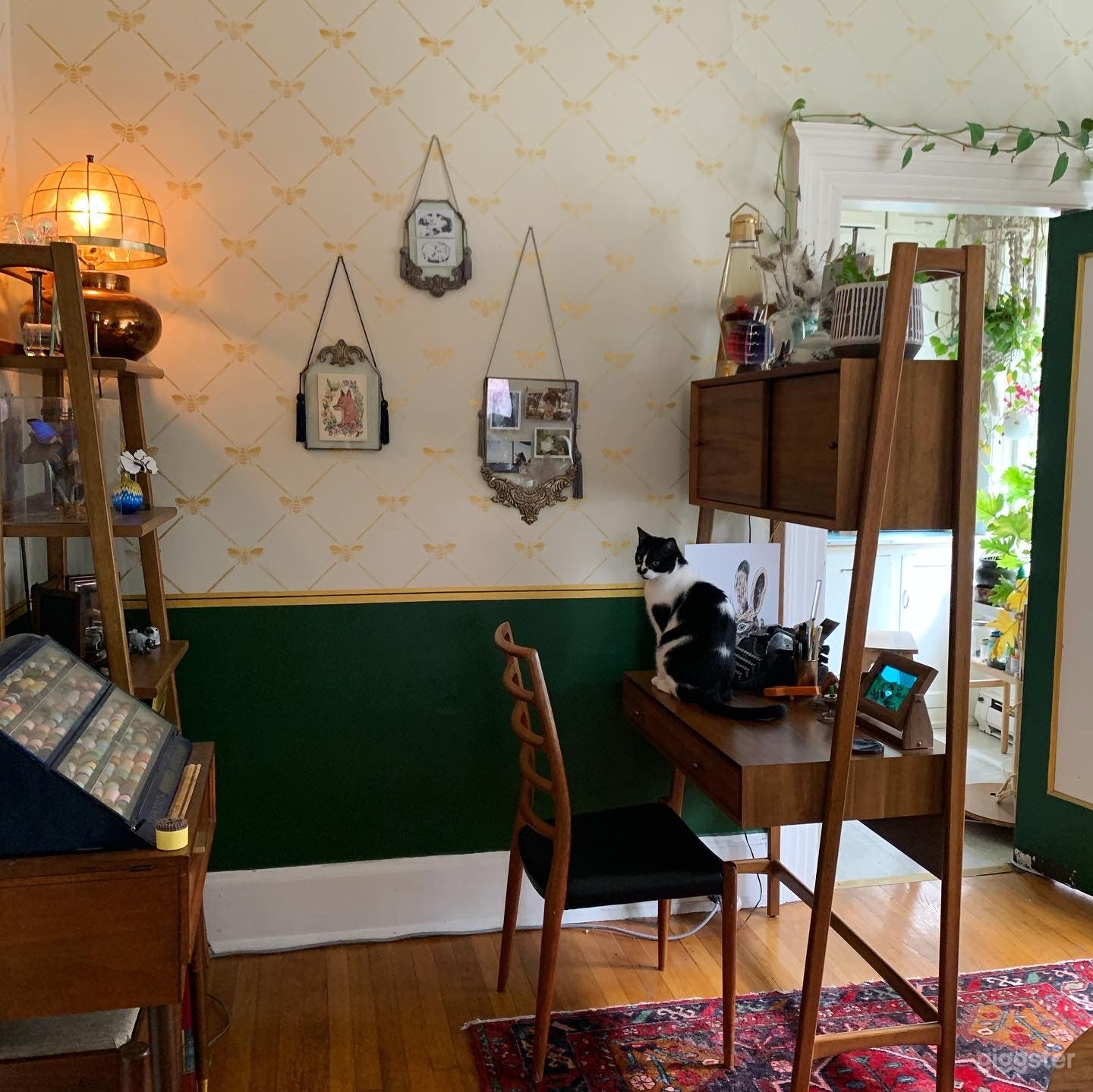 There is a small office set up in the dining room. 