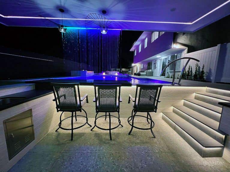 Modern LA-Style Outdoor Pool With Lounge Area Photo 3