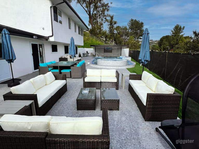 Modern LA-Style Outdoor Pool With Lounge Area Photo 4