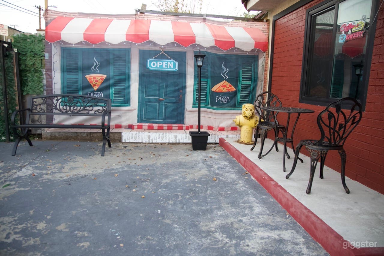 Outdoor Cafe Patio & Pizzeria Storefront Film Set Photo 1