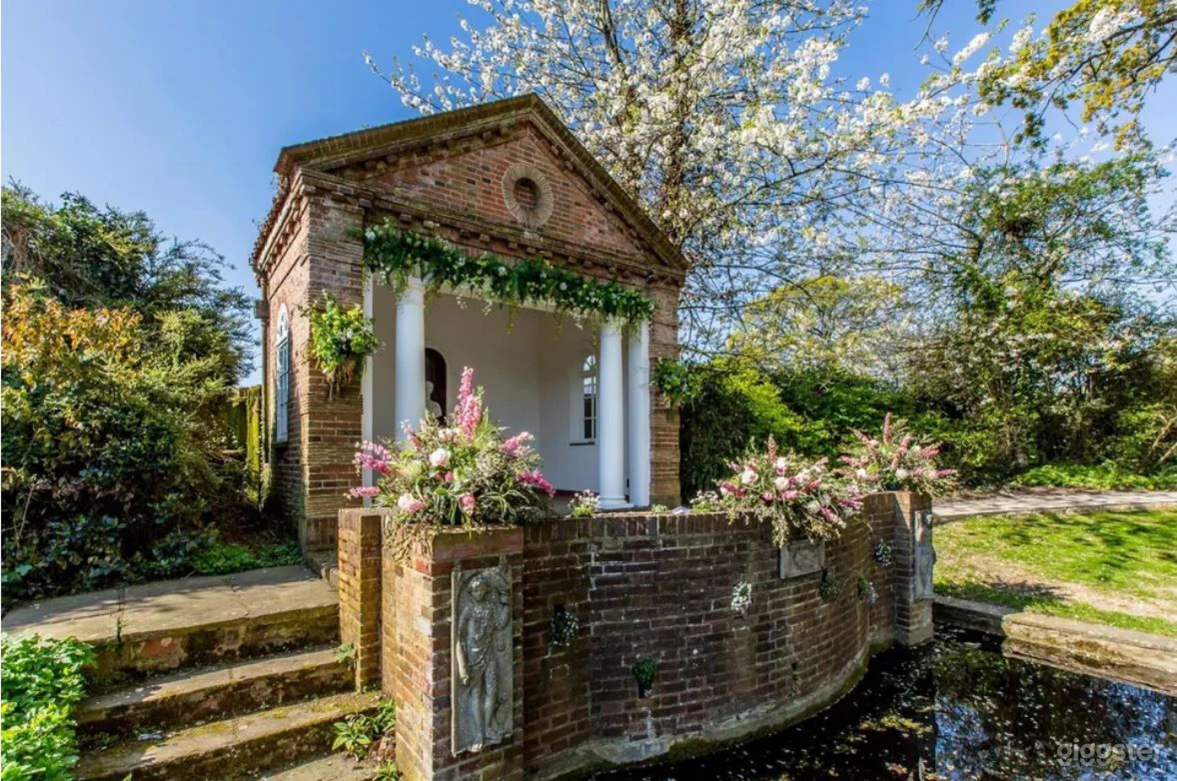Romantic Temple Area Overlooking a Glimmering Pond Photo 1
