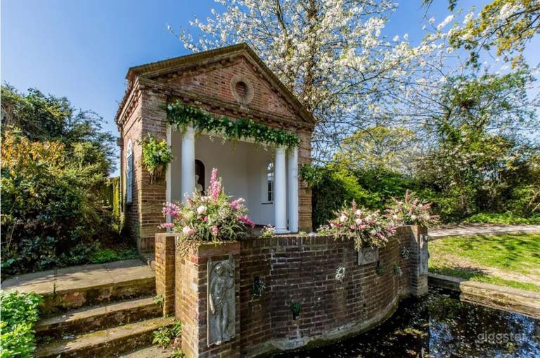  Romantic Temple Area Overlooking a Glimmering Pond 