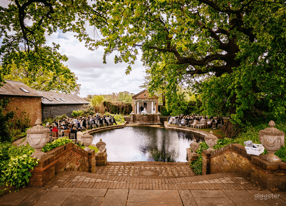 Romantic Temple Area Overlooking a Glimmering Pond Photo 2