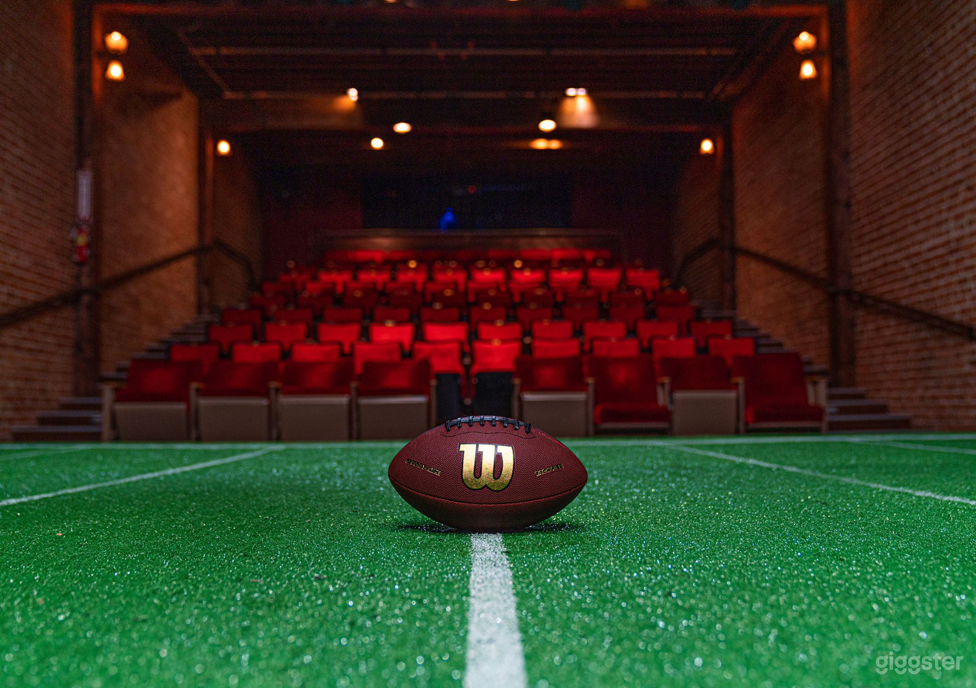 100 Red Seat Theatre with grid, lights, and sound equipment.