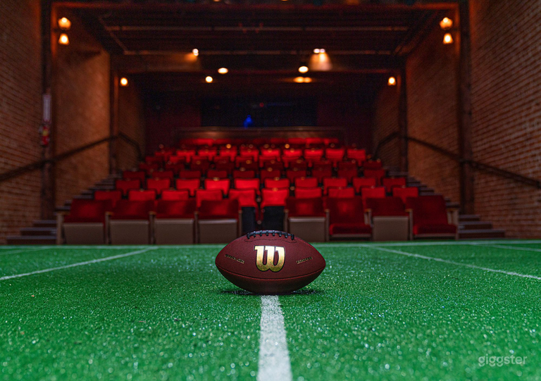  100 Red Seat Theatre with grid, lights, and sound equipment. 