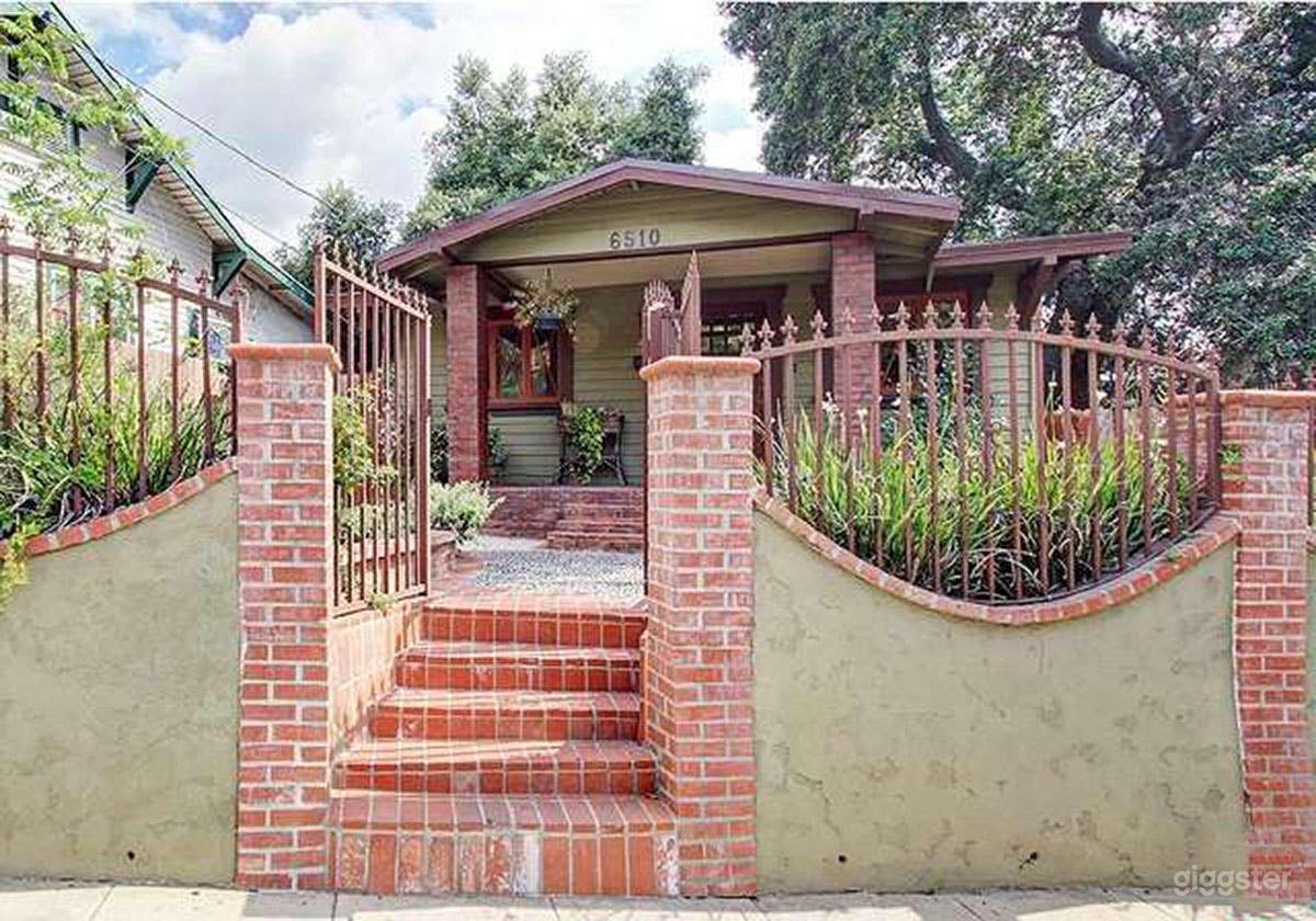 8 steps to get into the house, but there is a gated drive way on the left side also.