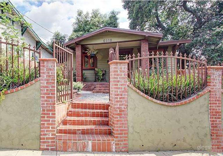  8 steps to get into the house, but there is a gated drive way on the left side also. 