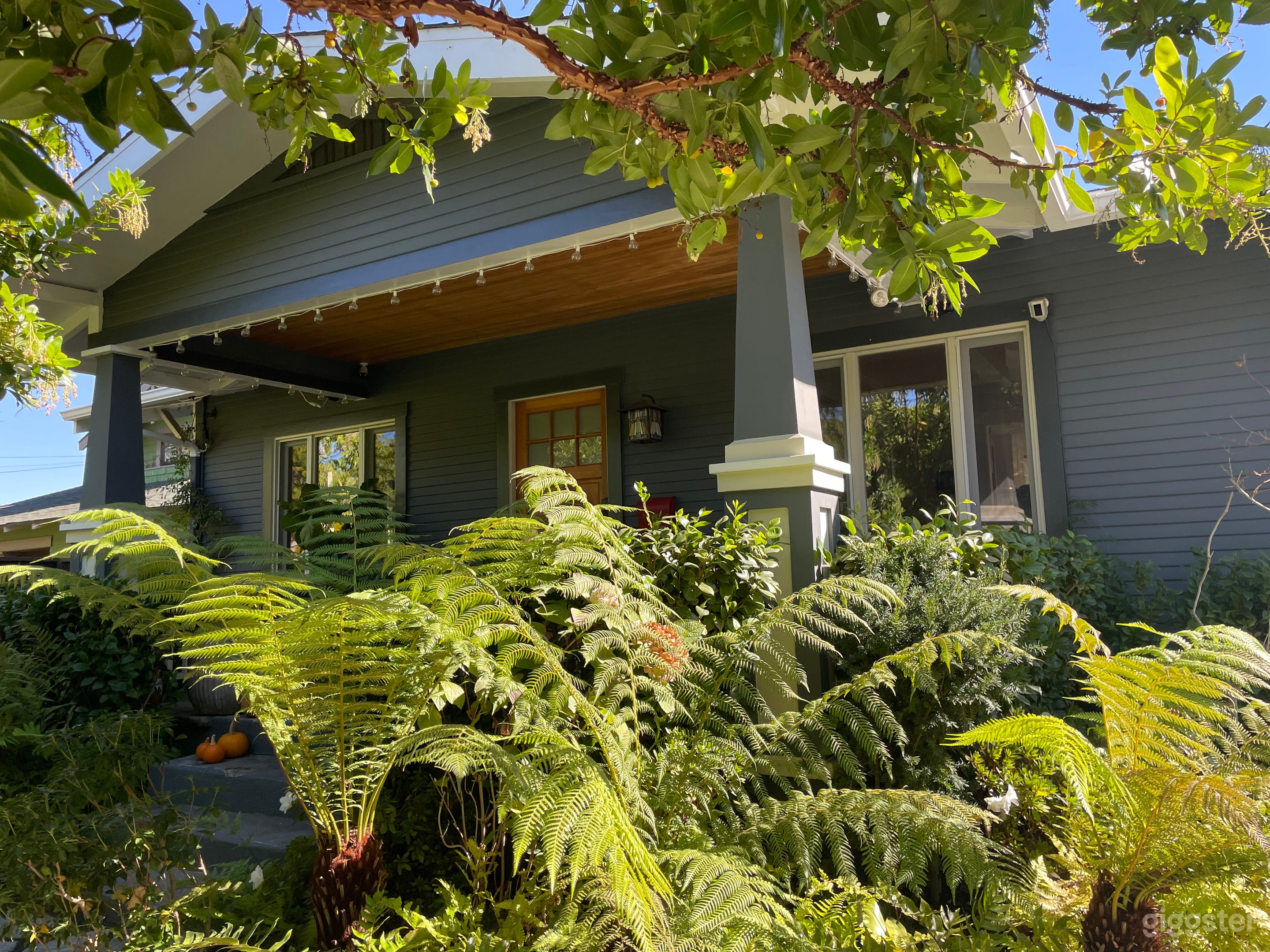 Recently painted home with inviting front porch and classic craftsman entry