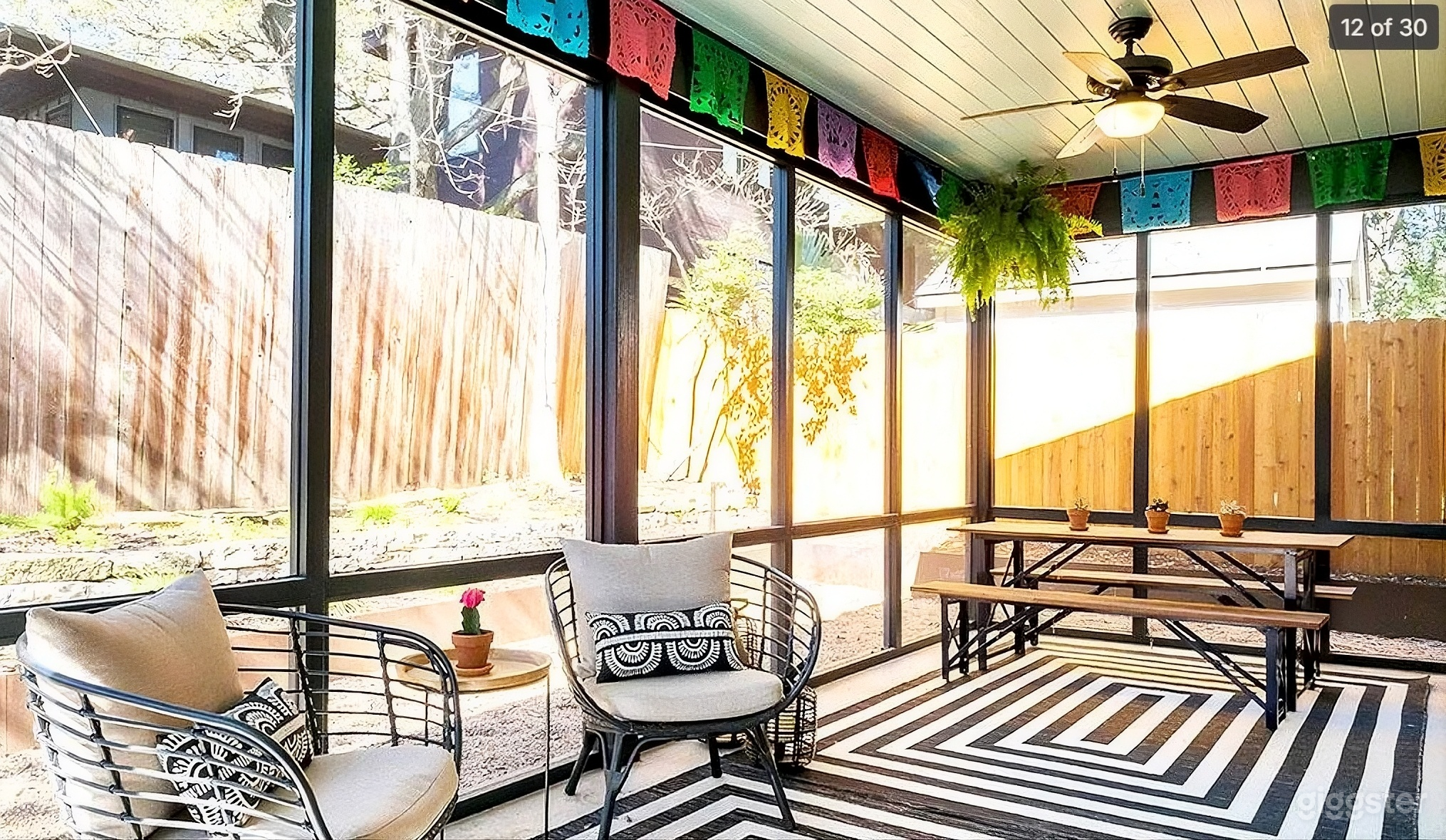 Iconic Black Farmhouse with the Pink Door Home! Photo 1