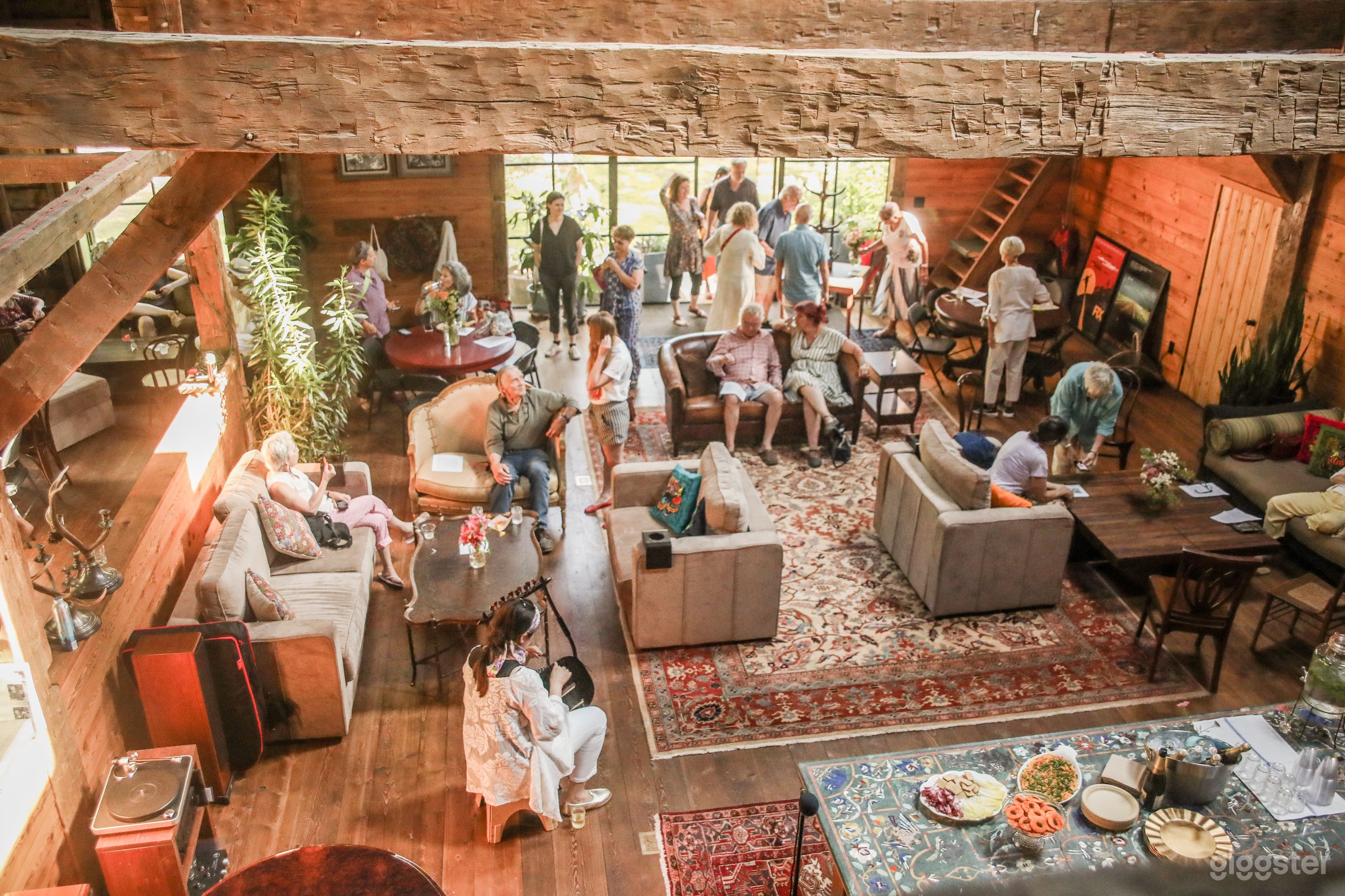 Opera listening party in the main room of the barn 