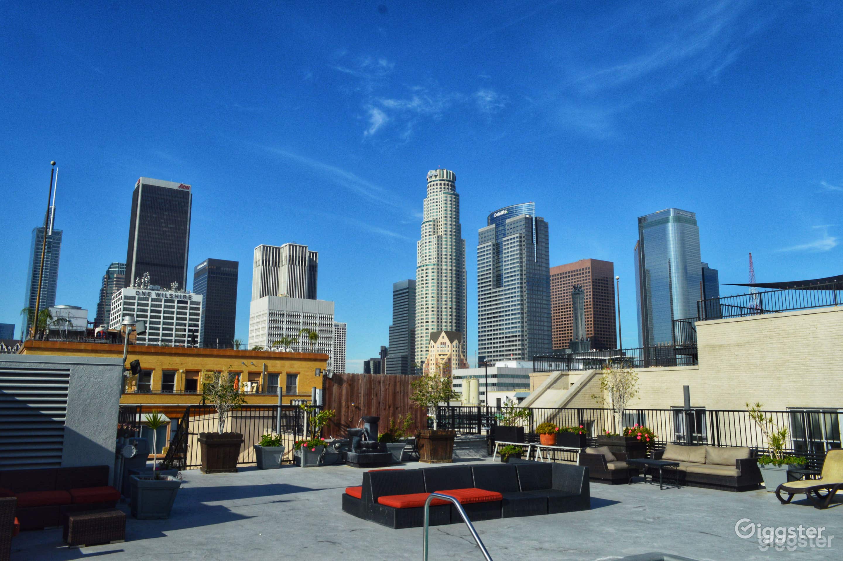 A Rooftop pool and jacuzzi in a Vibrant Penthouse Photo 3