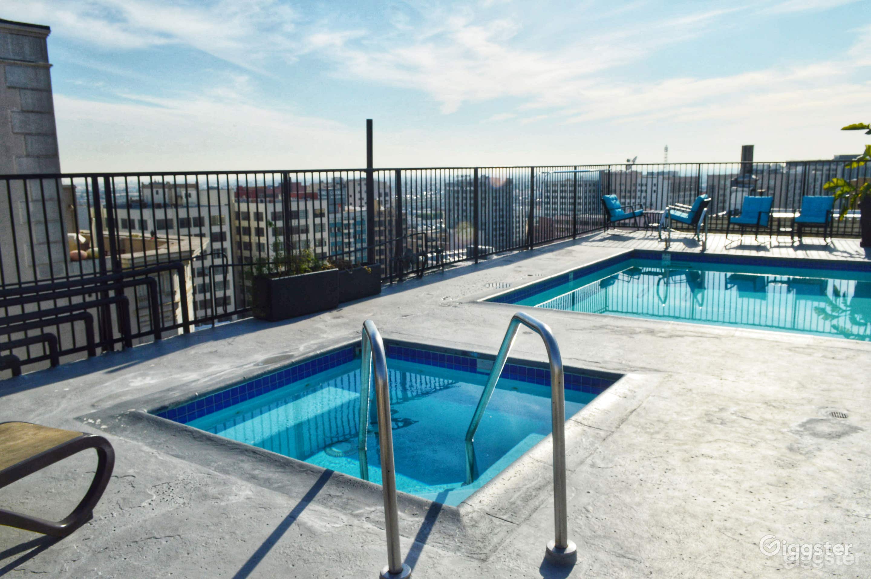 A Rooftop pool and jacuzzi in a Vibrant Penthouse Photo 4