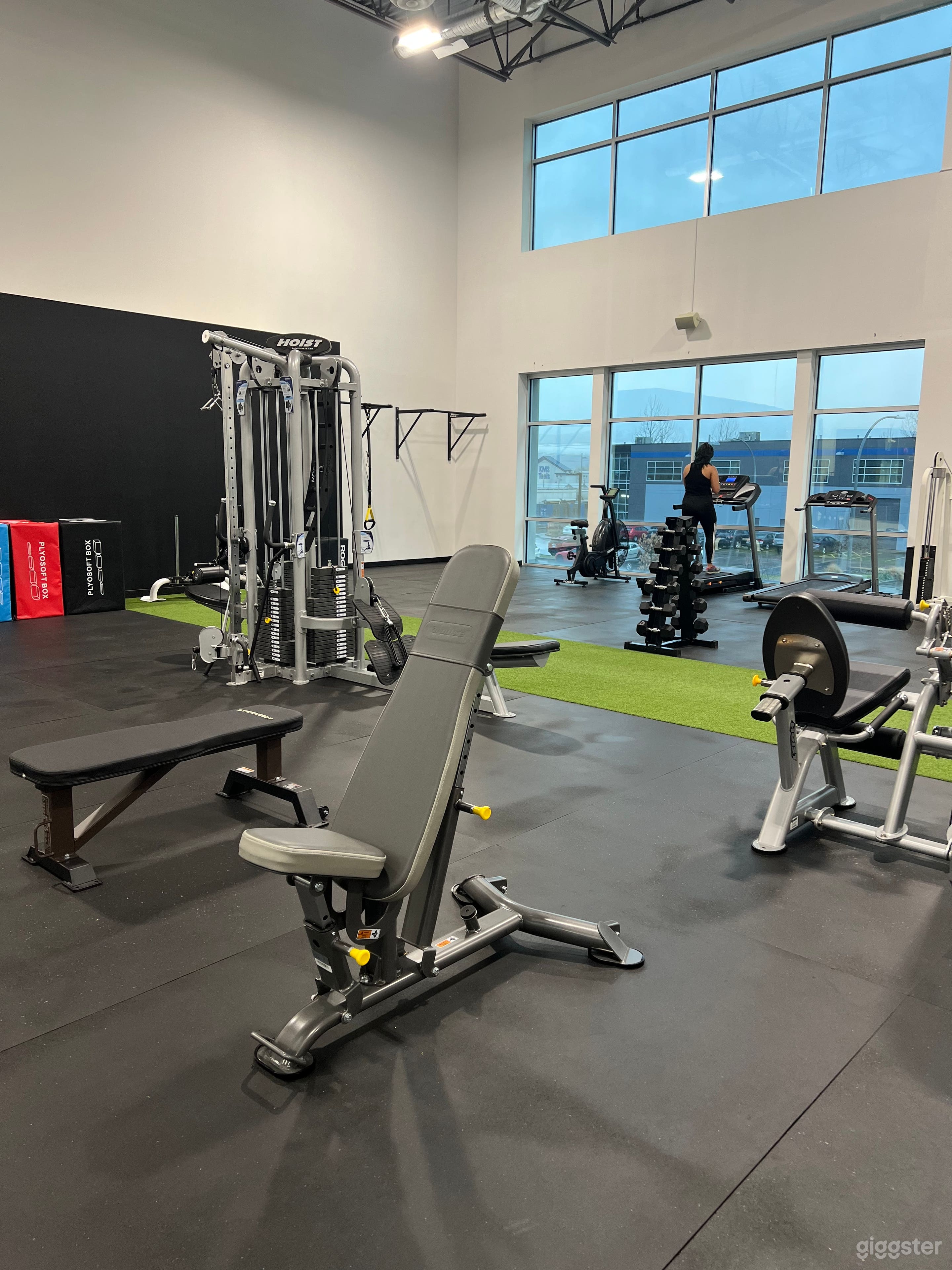 A Large Naturally Lit Industrial Style Gym Photo 3