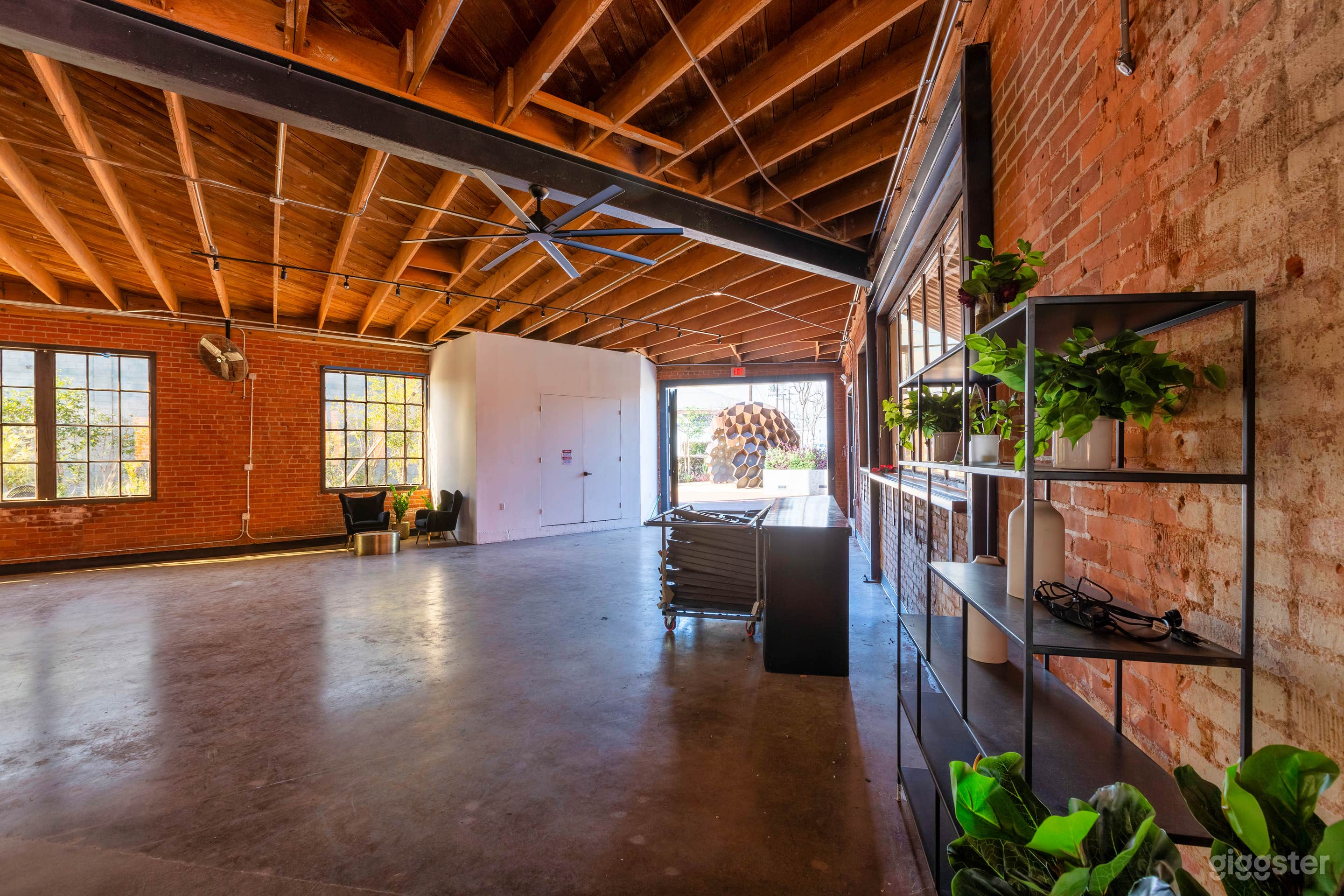 Industrial-Chic Venue with Indoor/Outdoor Flow & Kitchen Photo 1