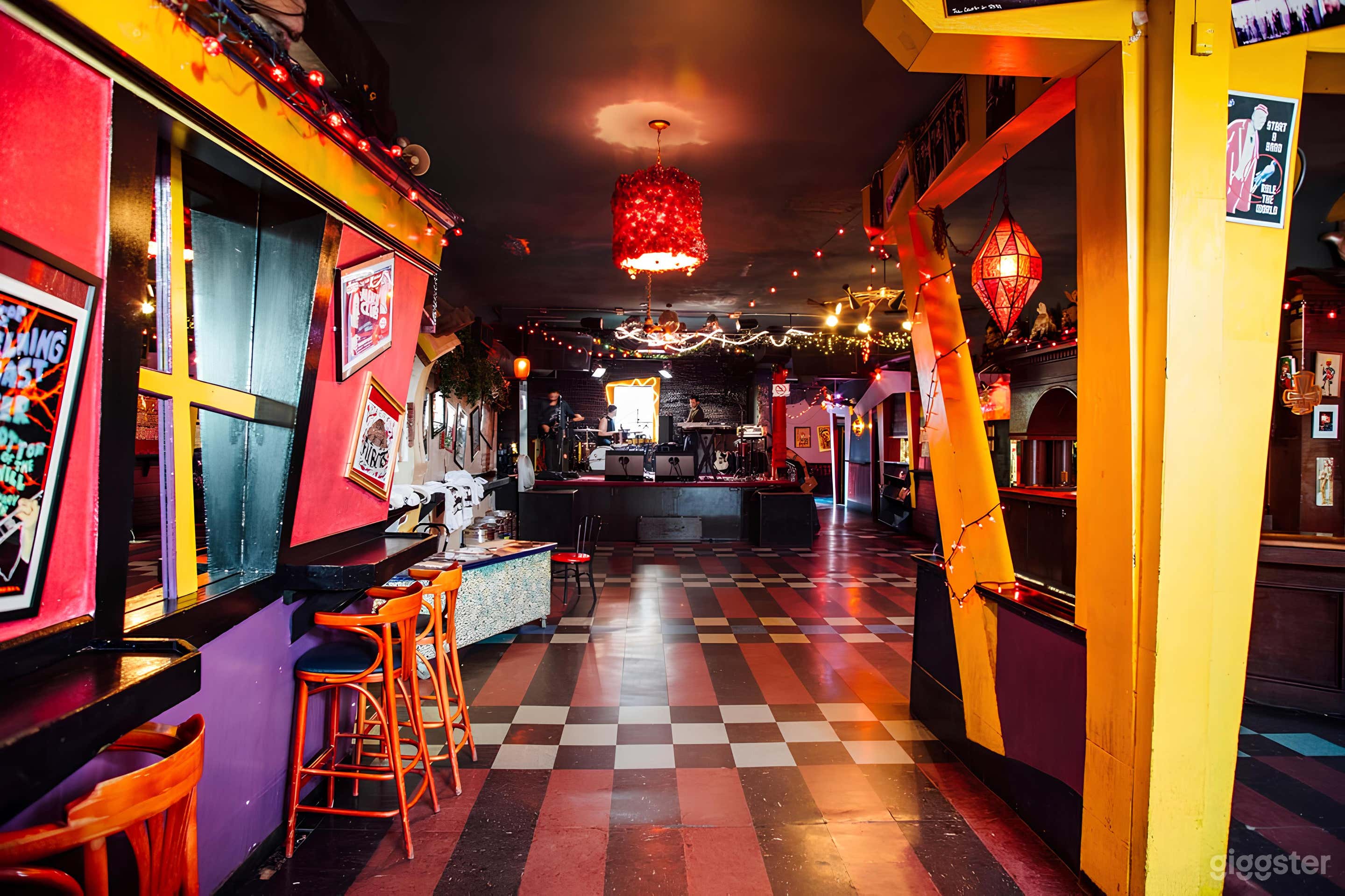 Colorful, edgy and DIY, there is a standing capacity of 246 people, a stage, full sound equipment, a fully functioning kitchen and bar, and an outdoor seating area.