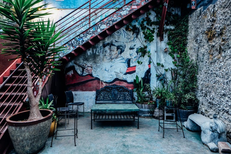  Eclectic and layered, the Bottom boasts murals and mosaics, ephemera and vintage decor - as unique as the musical performances it hosts. 