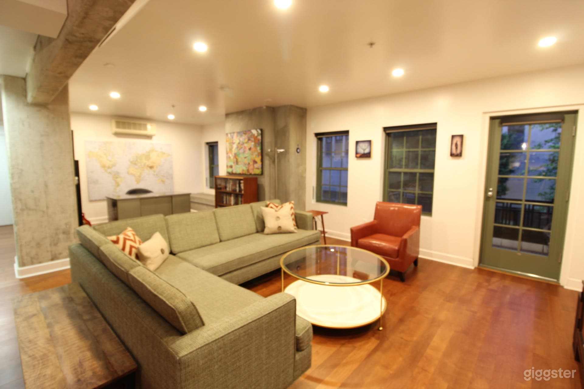 Living room with view of historic balcony. 