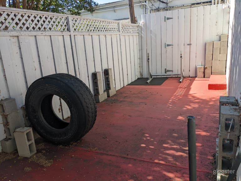  CLEAN AND WELL LIT FITNESS STUDIO WITH EQUIPMENT  