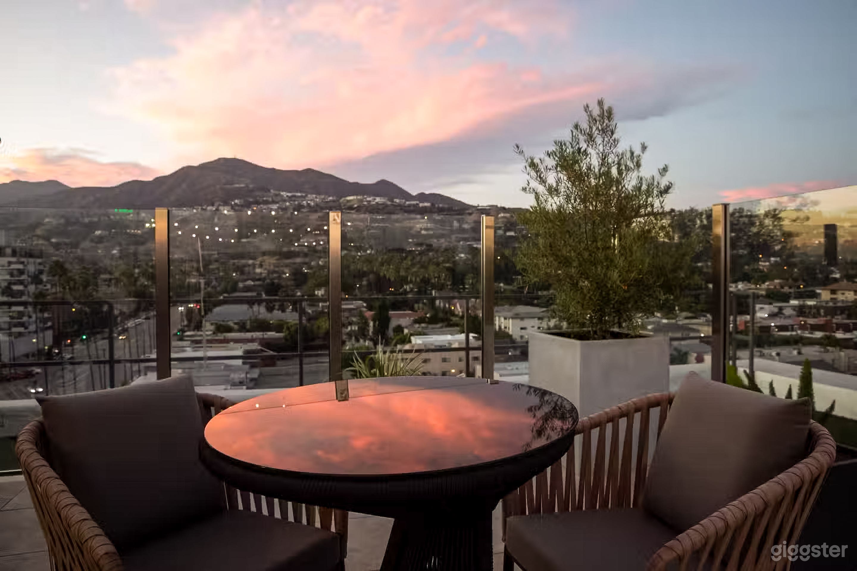 Luxury Skyline Rooftop Lounge with Panoramic City Views Photo 3