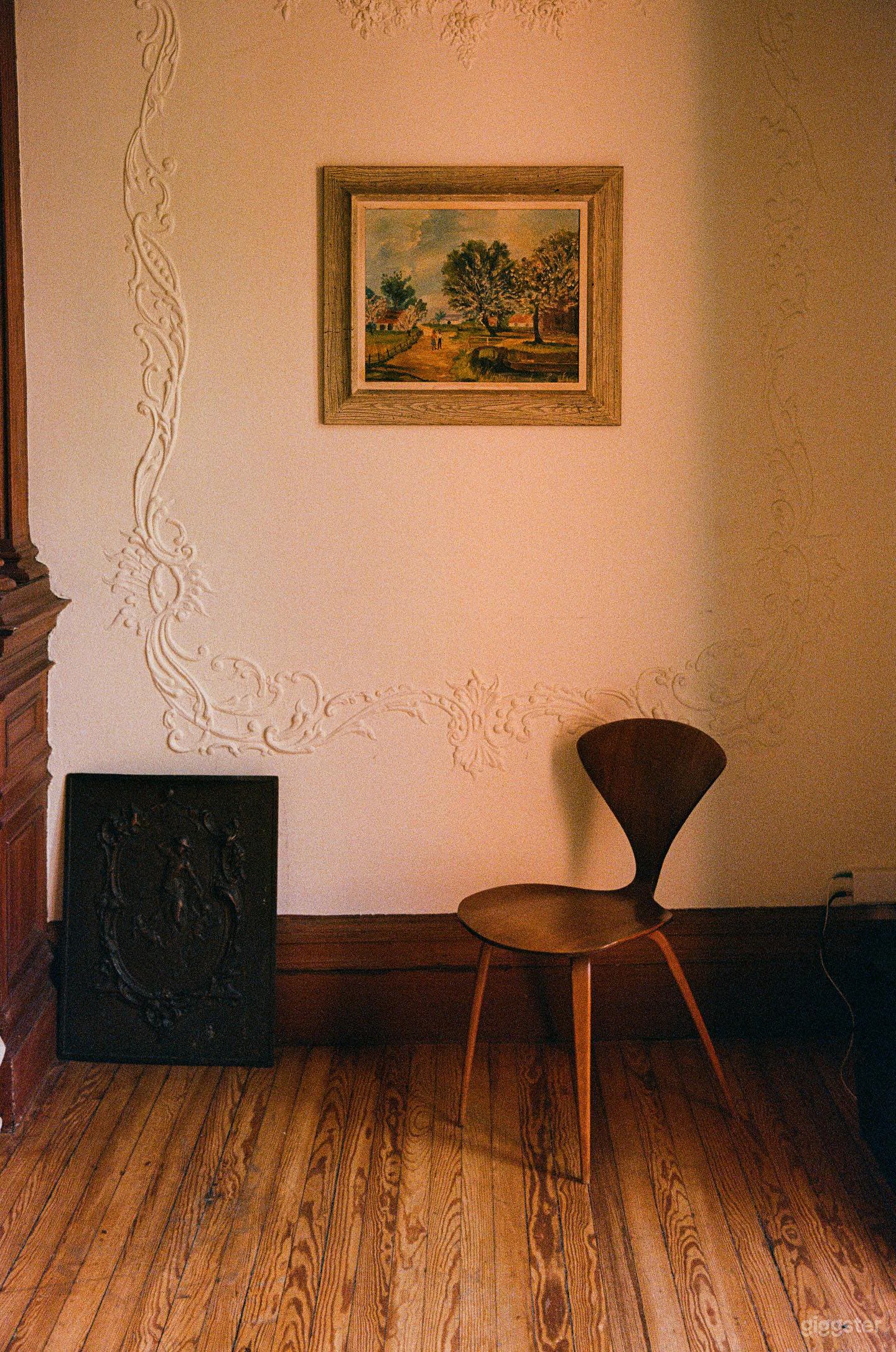 Vintage Furnished Space with Patterned Wallpaper Photo 2