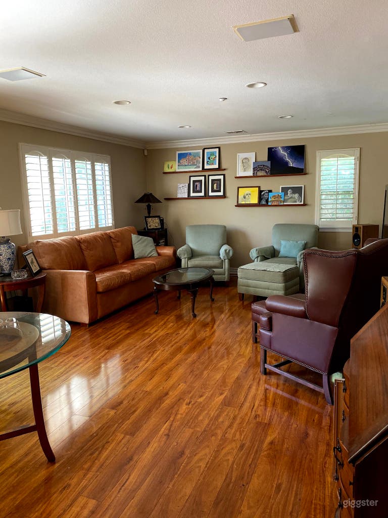 Family room with shuttered windows. 