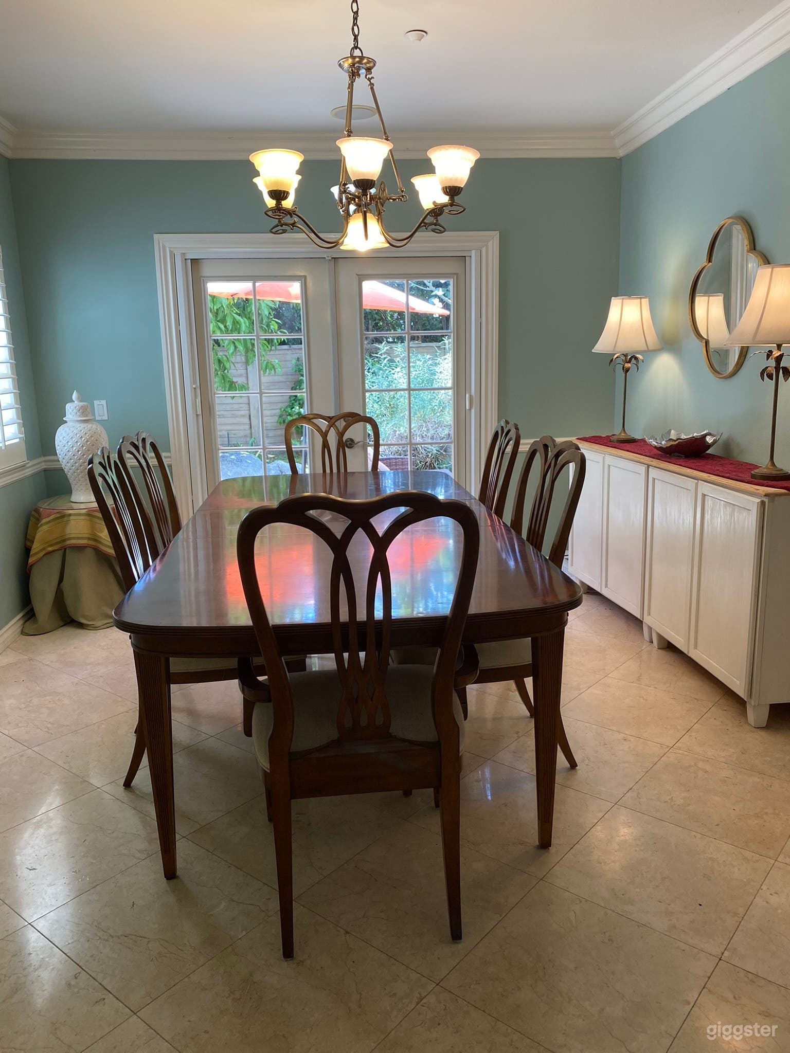 On the opposite end of the entry hall is the light-filled dining room.