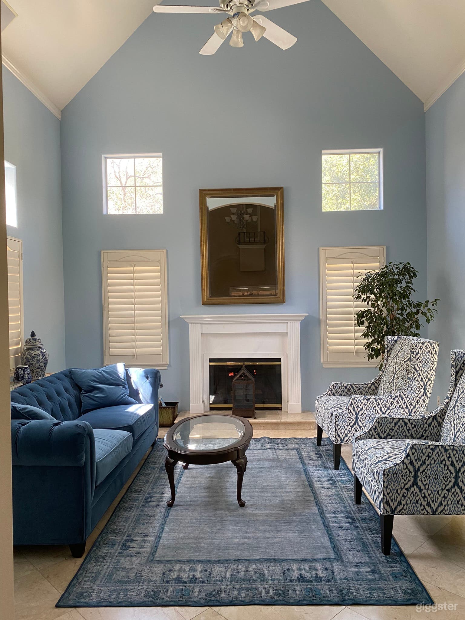 View of living room with fireplace.