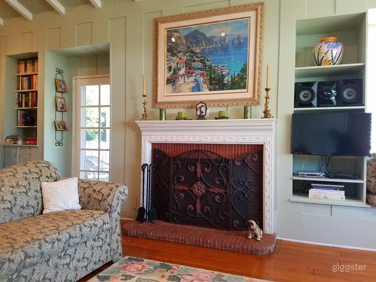  The wood burning fireplace is the focal point of the living room. 