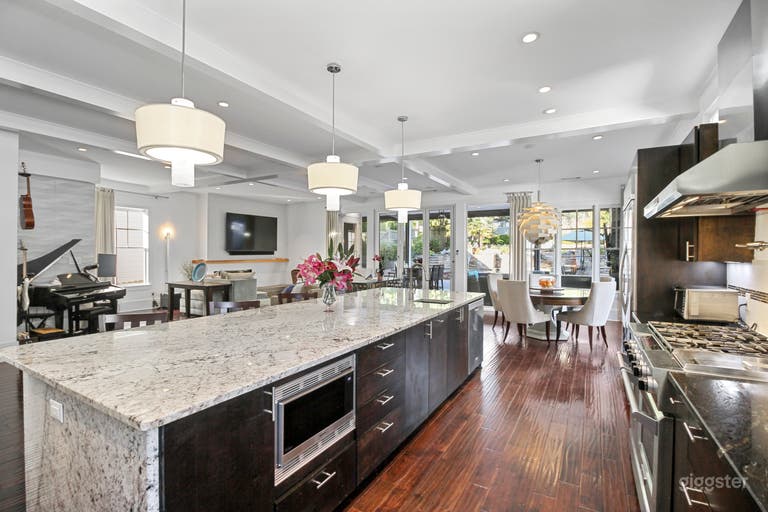  Oversized kitchen island provides ample space for eating and socializing 
