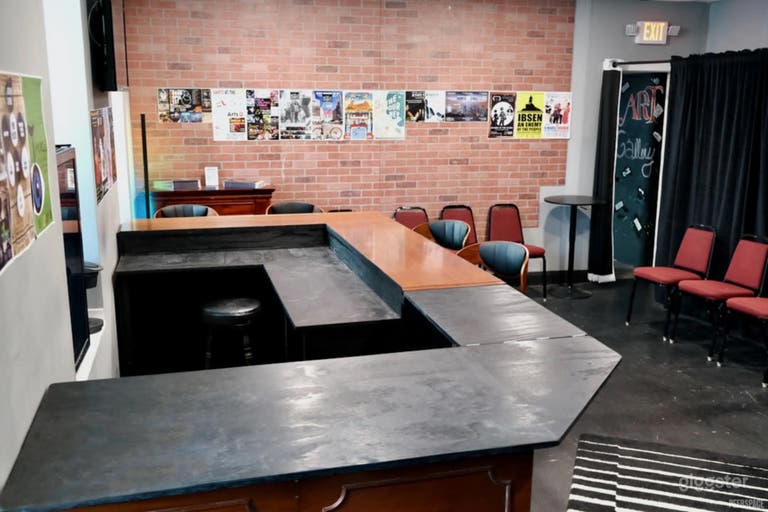  Lounge with bar and curtained passage to green room 