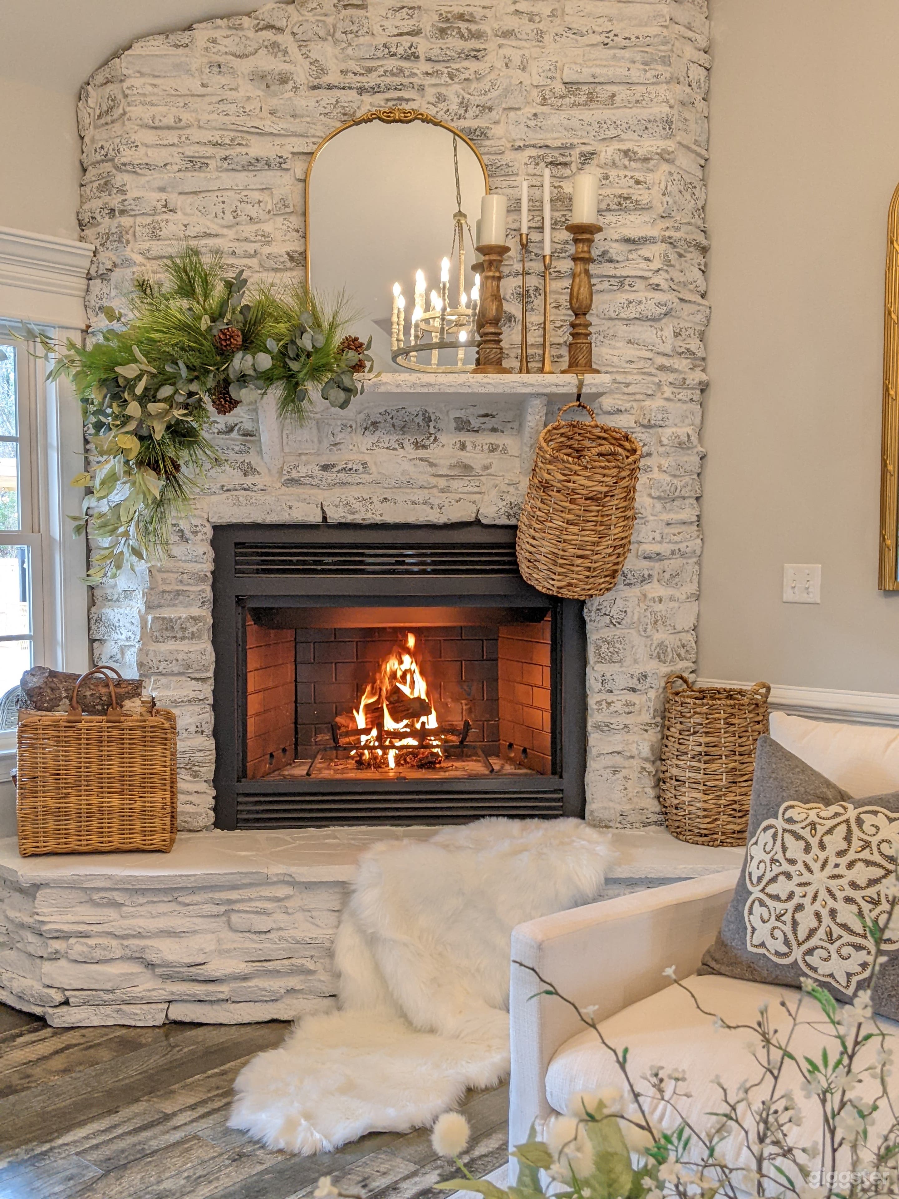 Hand crafted white stone fireplace with hearth and mantel. 
