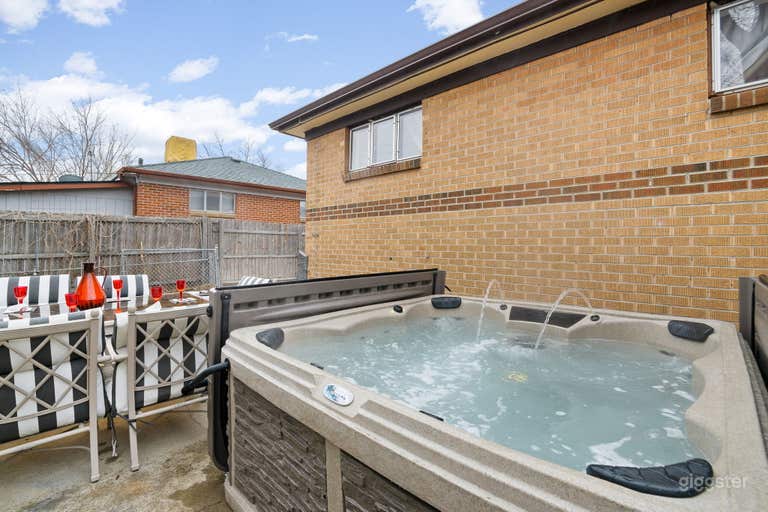  Luxurious Jacuzzi set in the tranquility of the outdoors, perfect for relaxation under the open sky. 