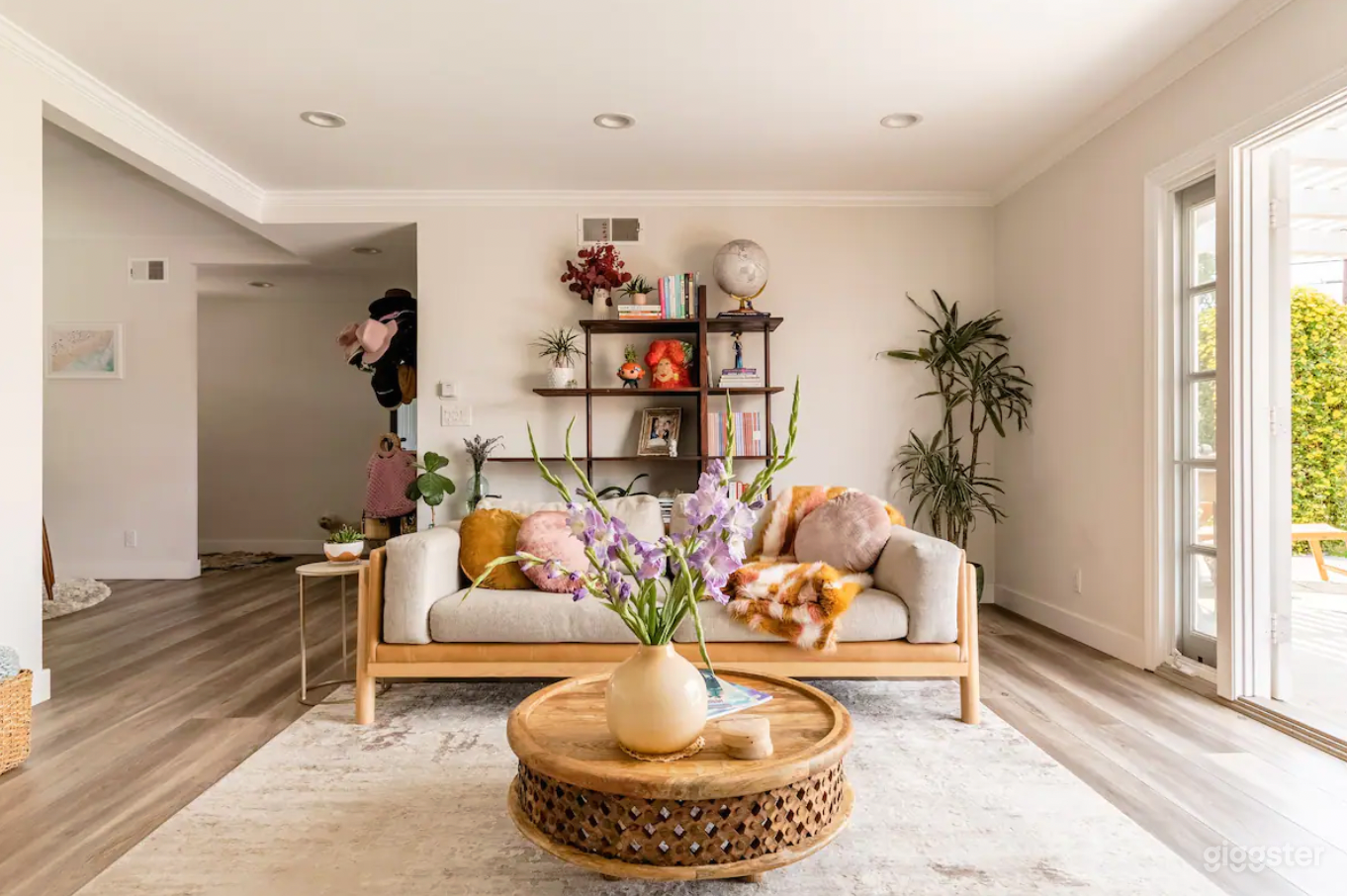 Living Room with Double French Doors leading to the big backyard.