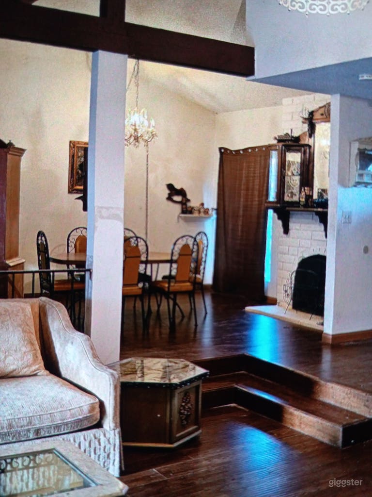  Dining room has vaulted ceilings and working gas fireplace and thick wood mantle.  