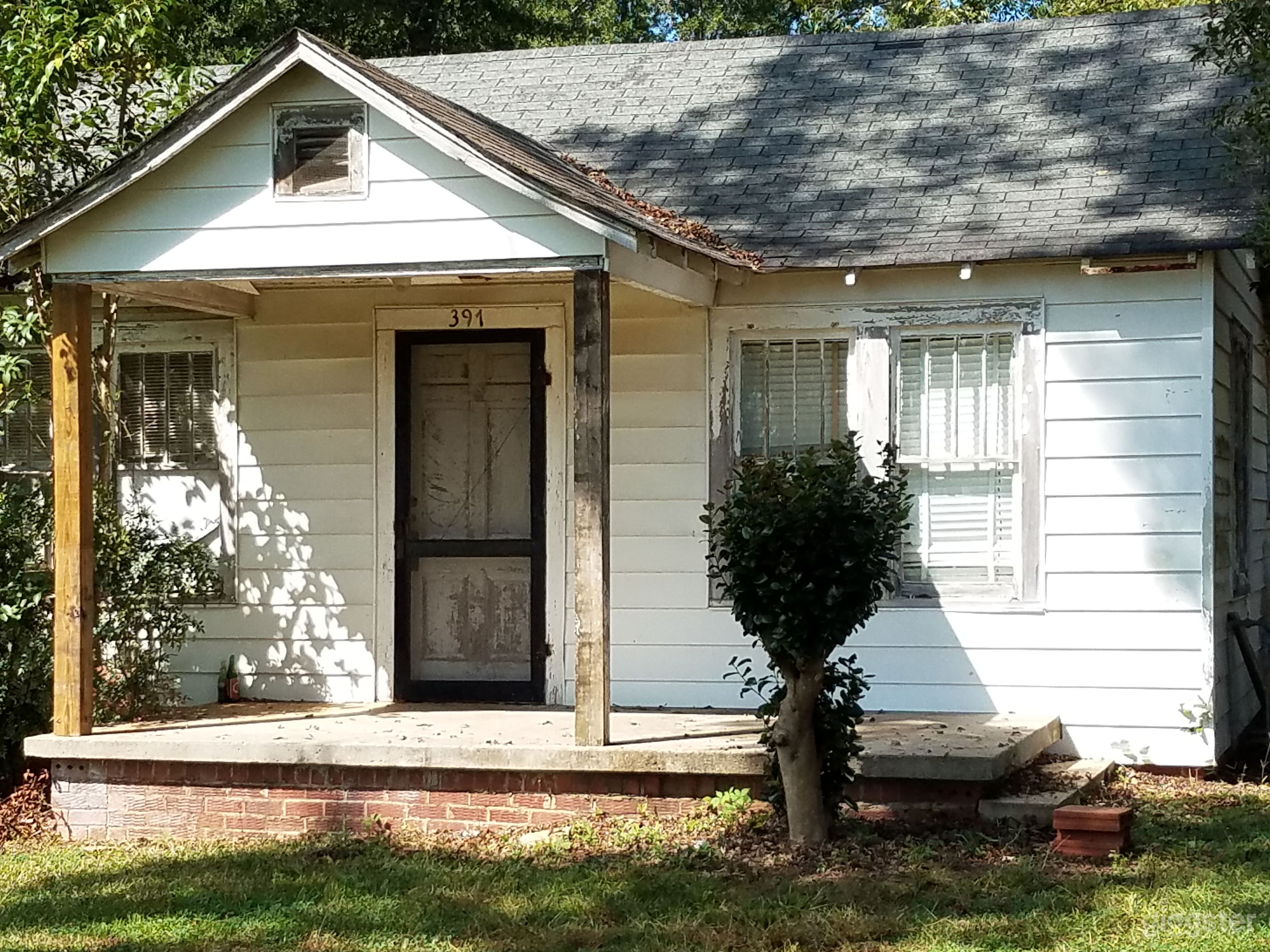 Frontal view of house.  House has 2 bedrooms, kitchen, bathroom and living room area