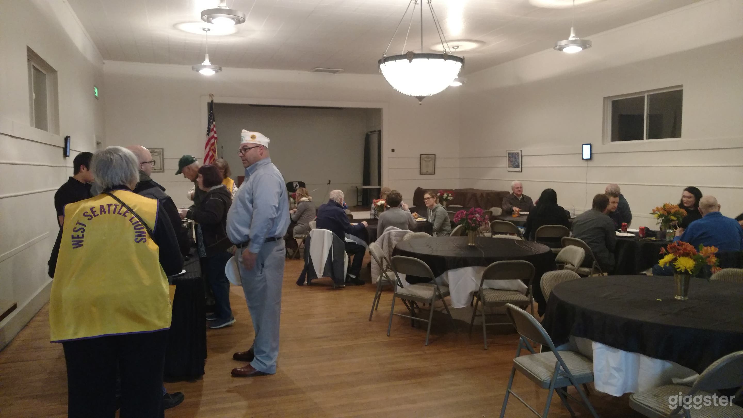 Interior of hall is 28x38 with a 10x14 stage in front.  Maple hardwood floor, dimmable School House lights, opening windows.