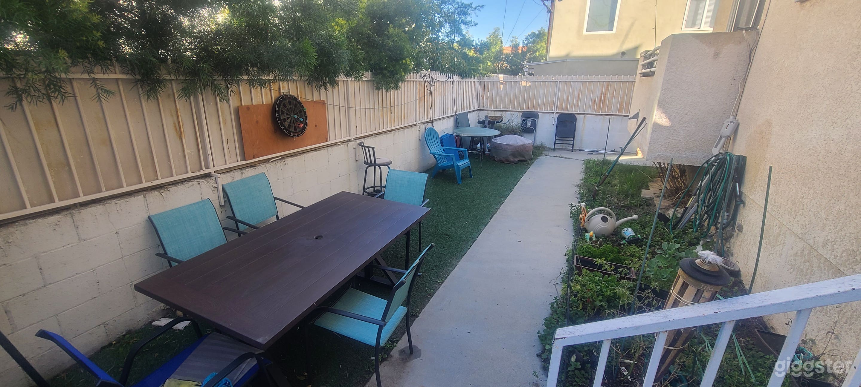 Backyard can be used for video village, craft services, extras holding, equipment. 